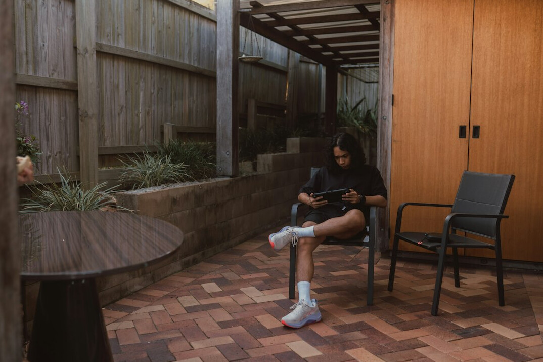 person gardening in backyard